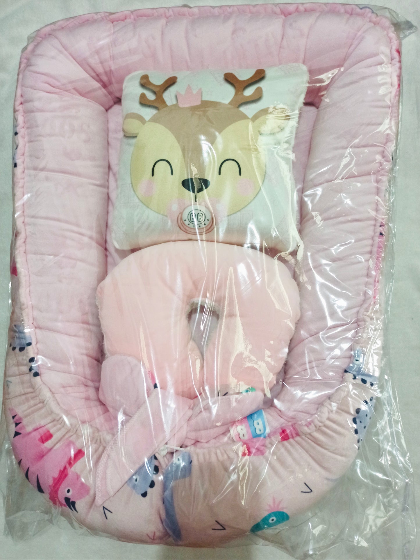 Nido con 2 almohadas