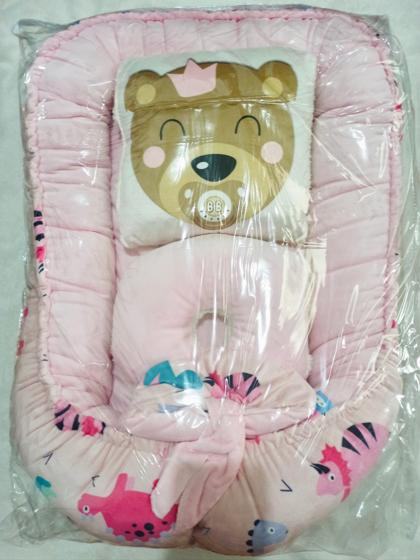 Nido con 2 almohadas