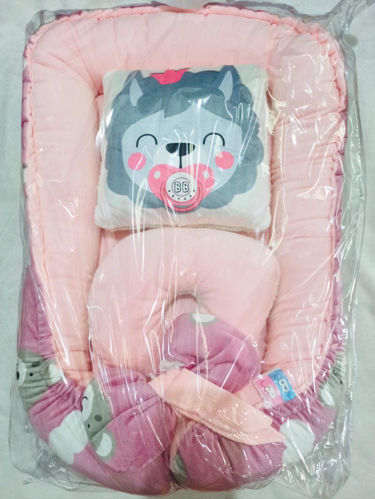Nido con 2 almohadas