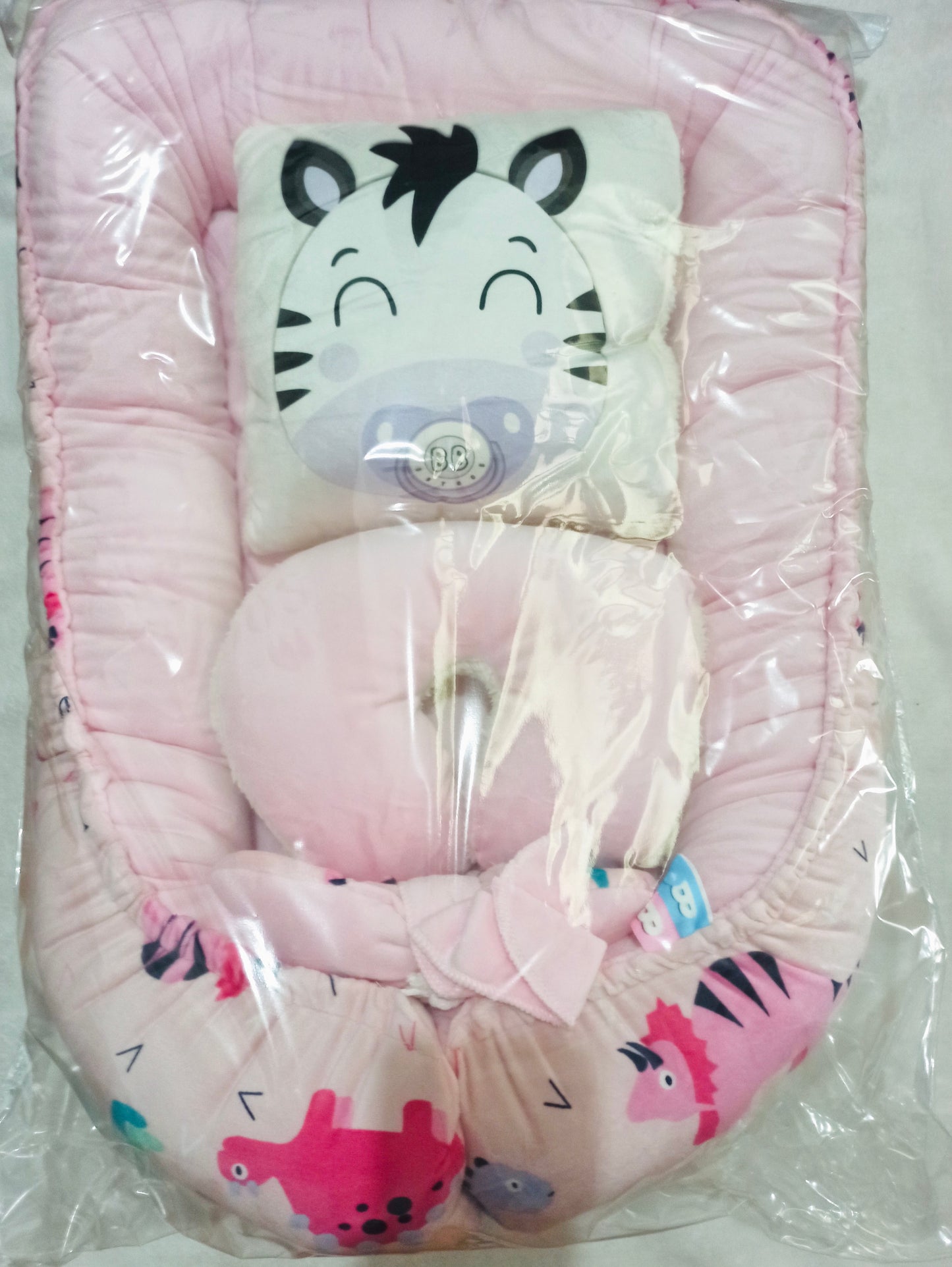 Nido con 2 almohadas