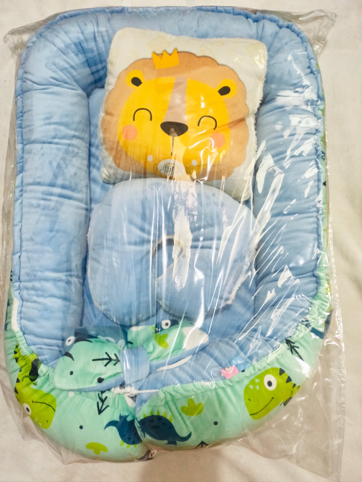 Nido con 2 almohadas
