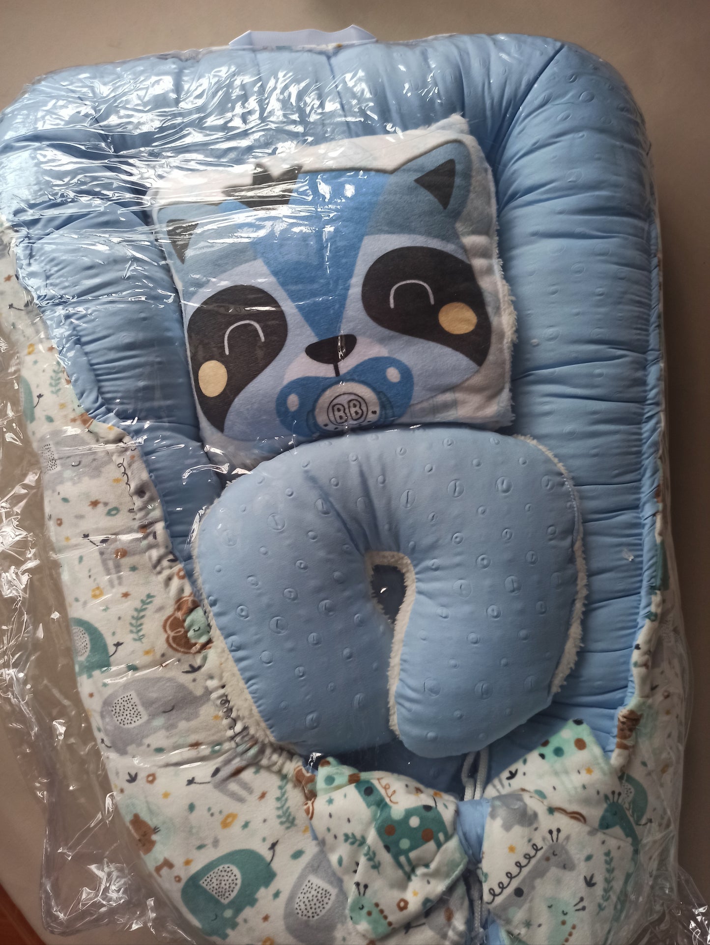 Nido con 2 almohadas