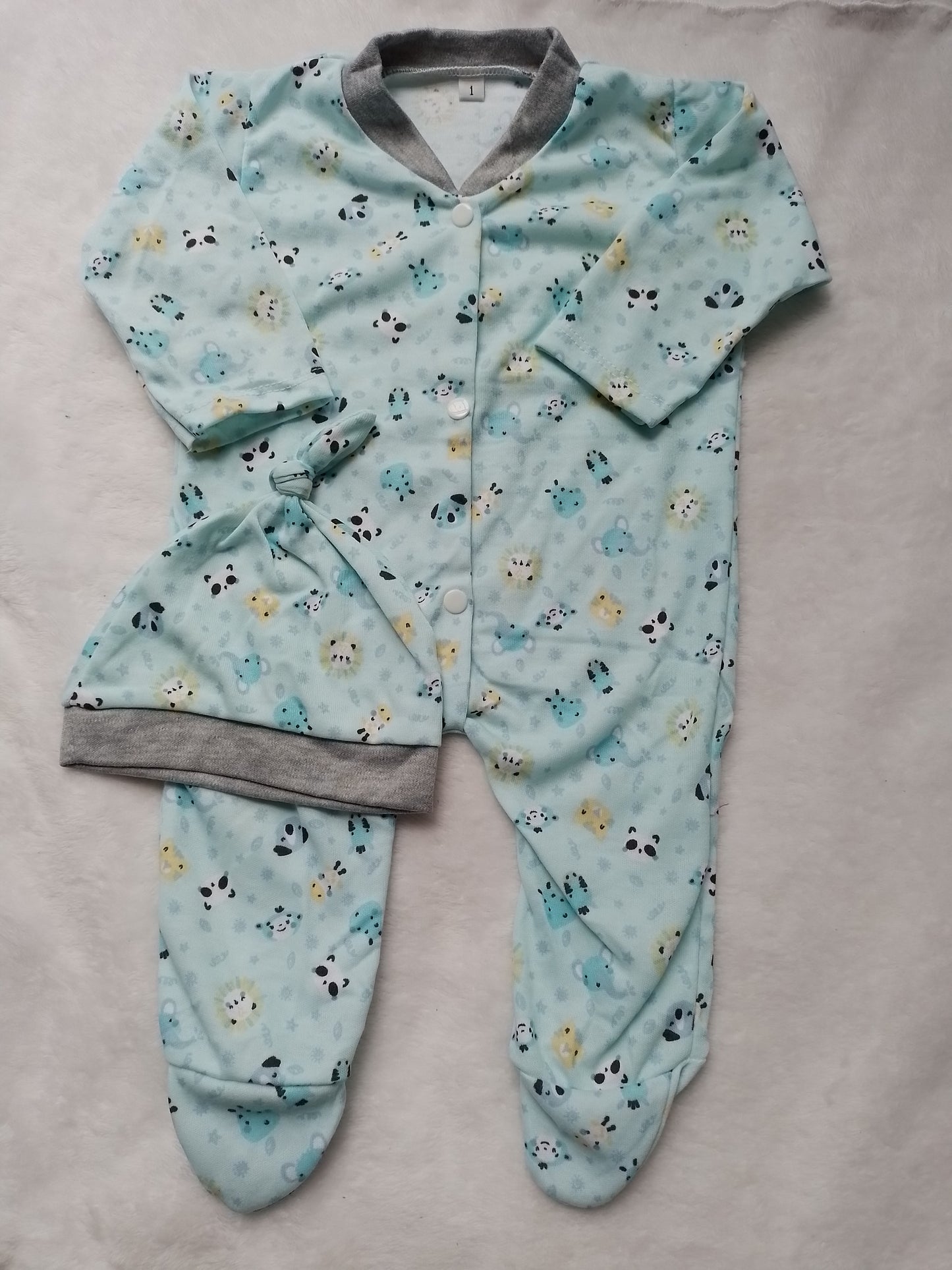 Pijama enteriza con gorro niño