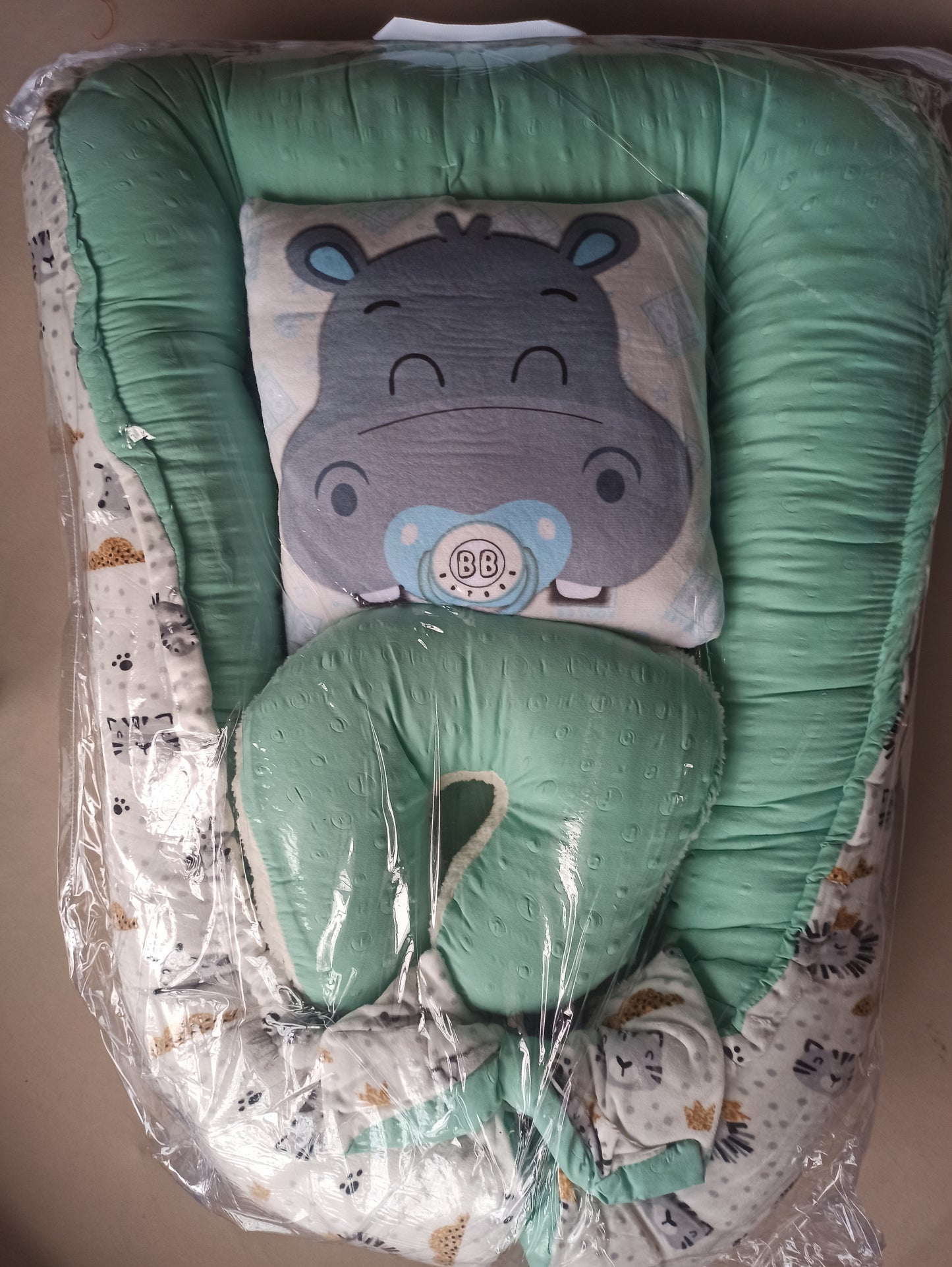 Nido con 2 almohadas