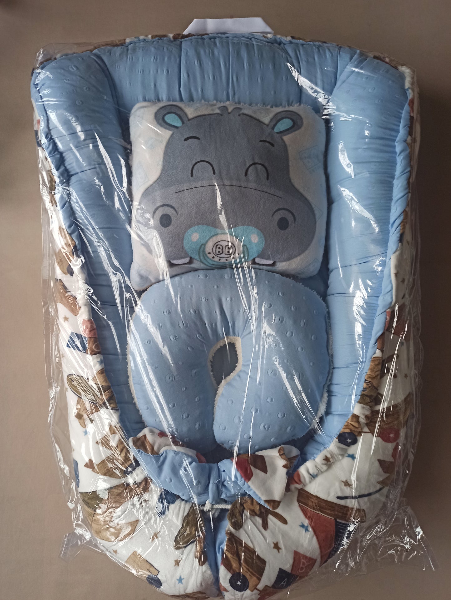 Nido con 2 almohadas