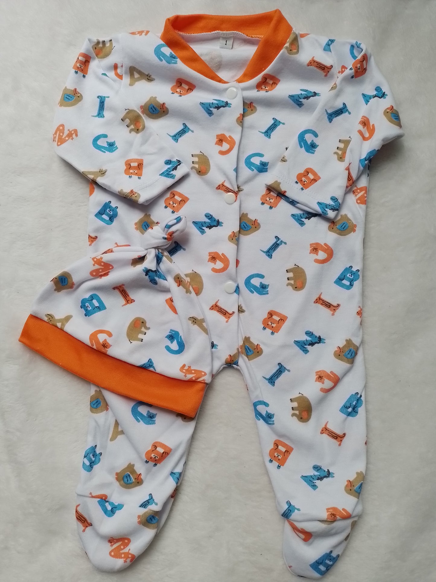 Pijama enteriza con gorro niño