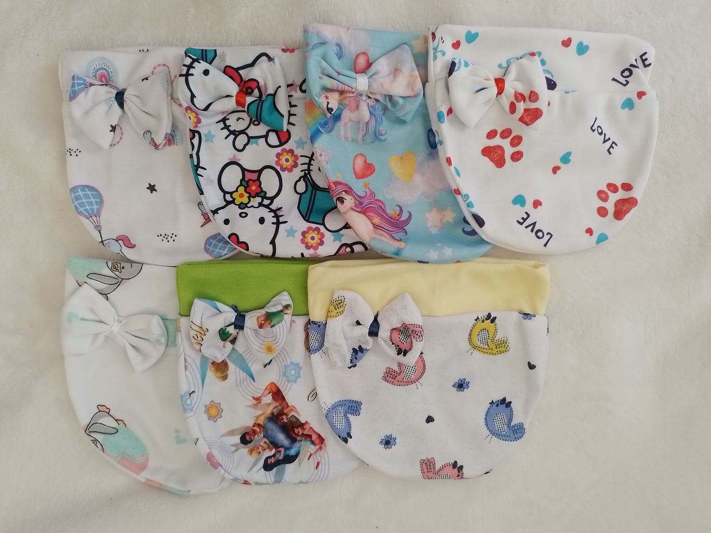 Set x7 Gorros niña