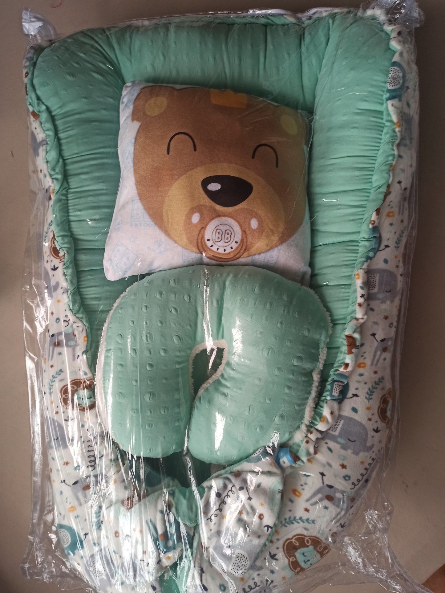 Nido con 2 almohadas