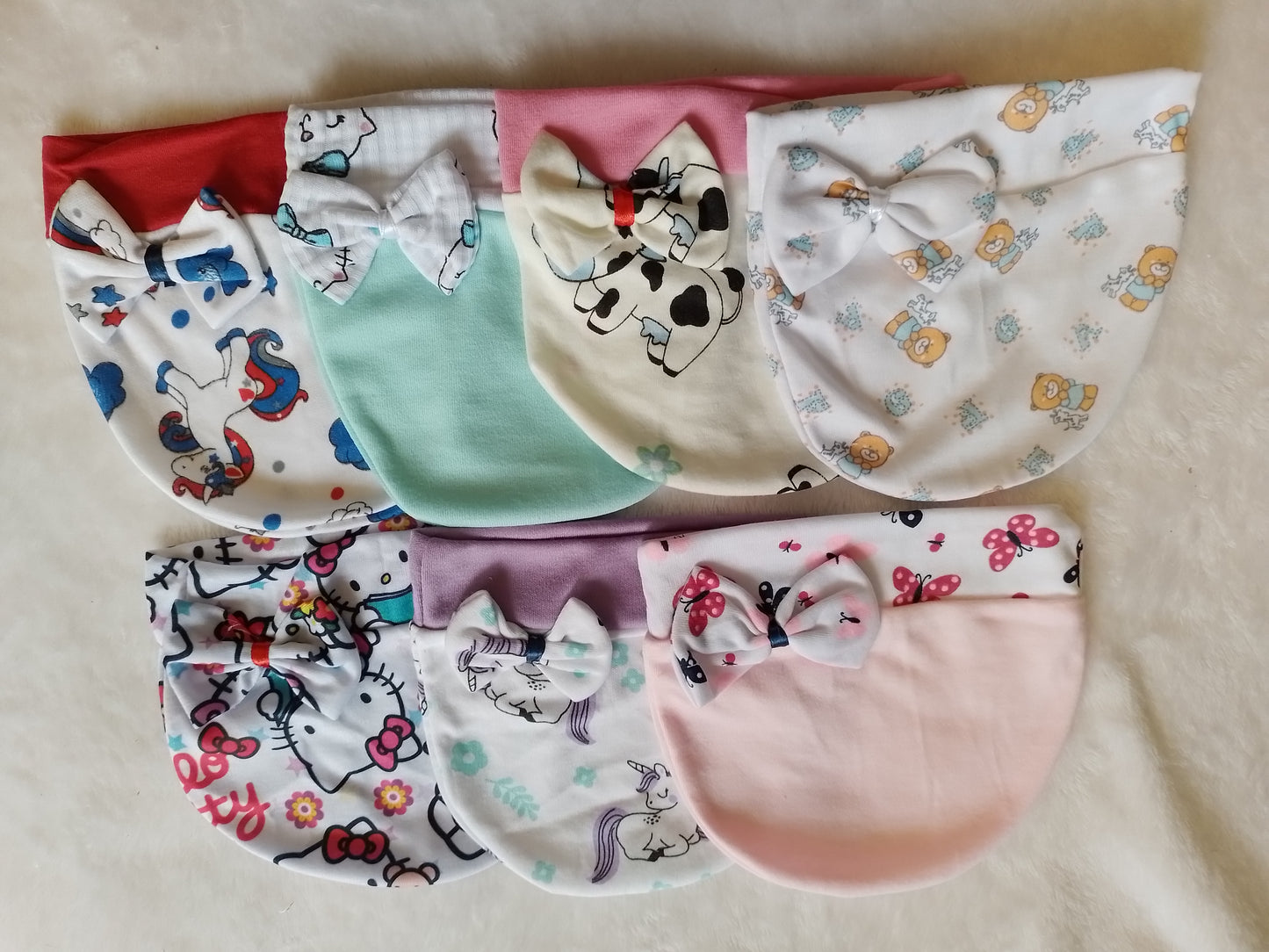 Set x7 Gorros niña