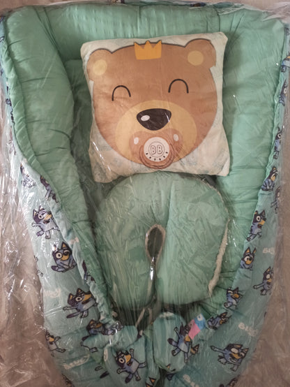 Nido con 2 almohadas