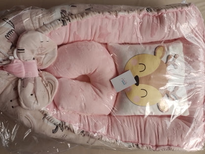 Nido con 2 almohadas