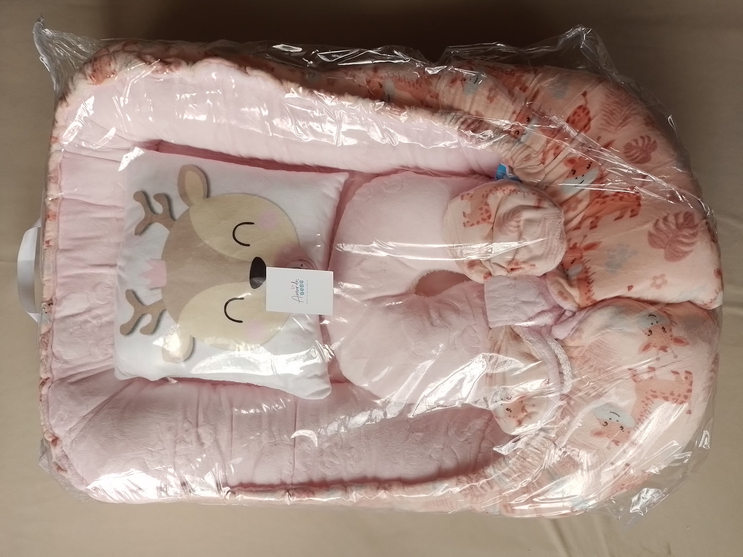 Nido con 2 almohadas