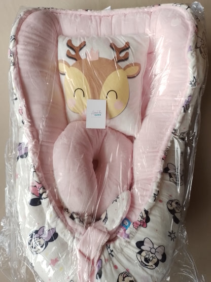 Nido con 2 almohadas