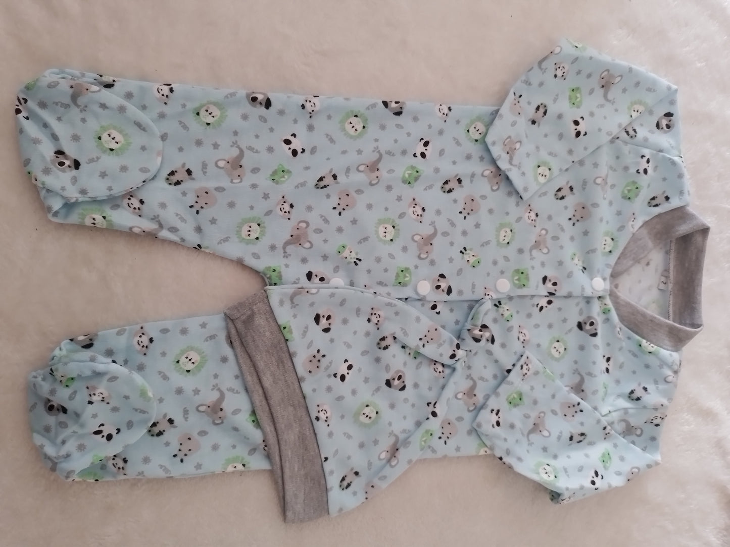 Pijama enteriza con gorro niño