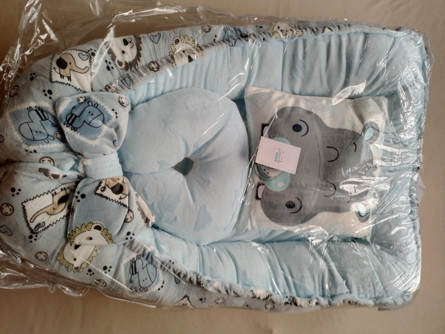 Nido con 2 almohadas