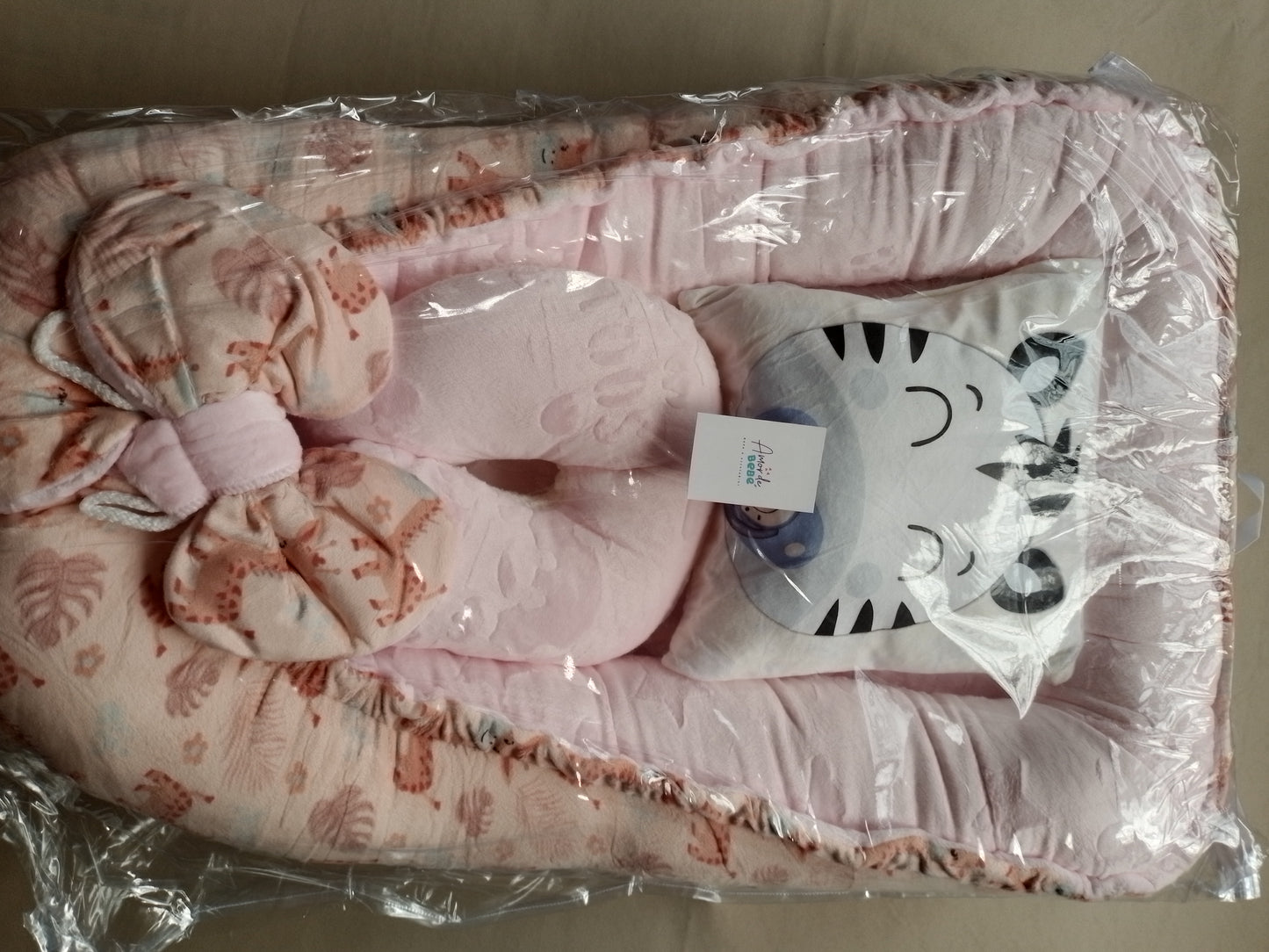 Nido con 2 almohadas